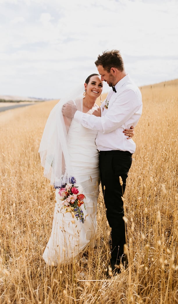 Happy couple walking down the aisle after saying I do on the Sunshine Coast and Noosa Wedding