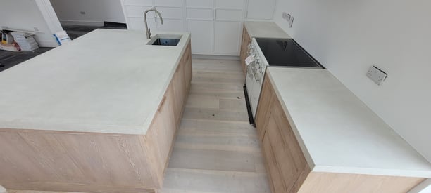 White polished concrete centre island and countertop