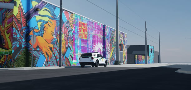 a van parked in front of a colorful mural of a mural of a woman