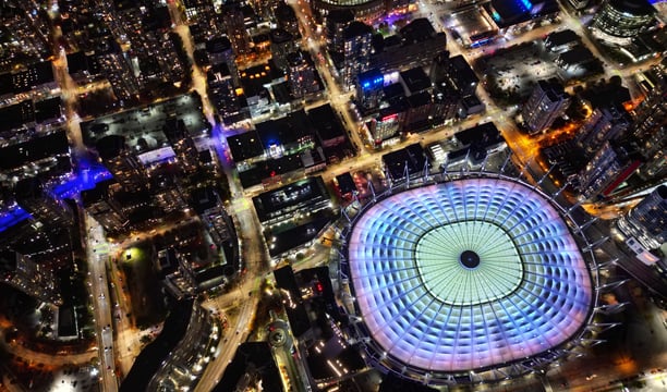 a large circular shaped building with a large circular shaped building