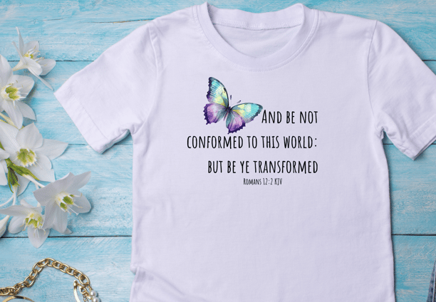 a t-shirt mockup. Background is a wood blue floor with flower and jewelry accents around the t-shirt
