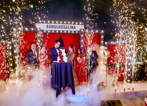 I do Me too in a wedding ceremony stage decorated by Kathmandu Wedding