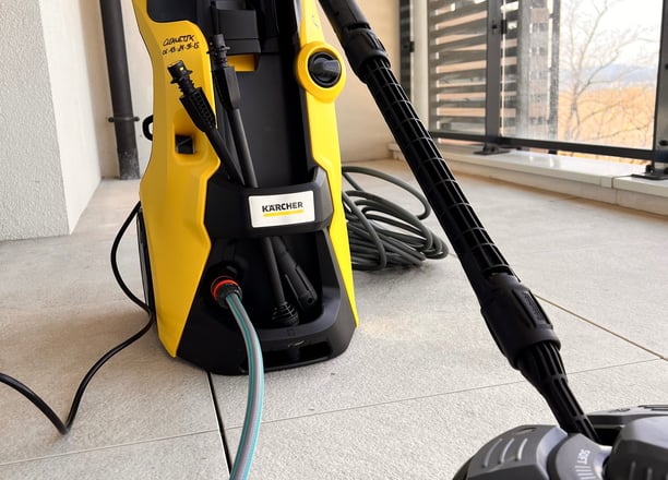 a yellow vacuum cleanerer sitting on the floor