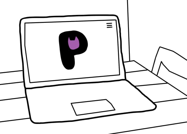 laptop drawing on table with purrsonal logo on screen