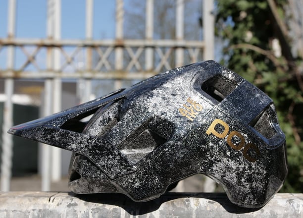 a MTB POC Helmet customized with marbling effect and gold