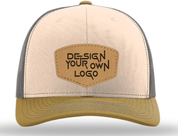 a hat - cap - cap - style design on a beige and tan leather baseball