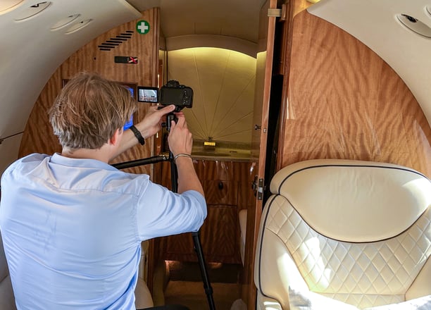 behind the scenes of a privet jet photo shoot with taylwind media