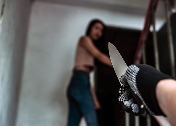 edged weapon threat to woman