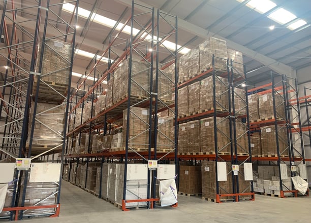 tall pallet racking in narrow aisle configuration with rack end protectors  