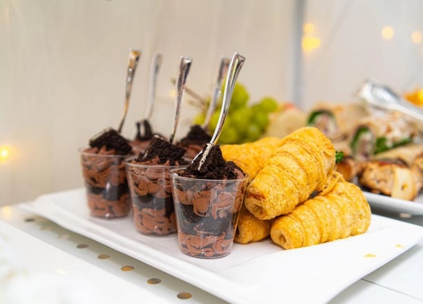 a table with desserts and desserts