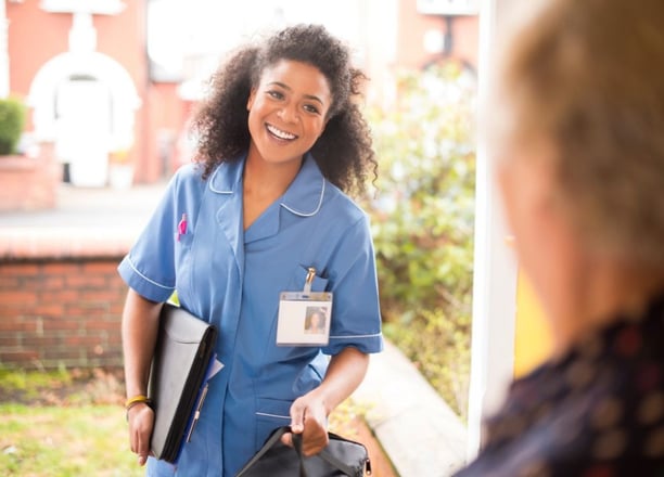 physiotherapy at home for seniors - a physiotherapist arriving for a physiotherapy home visit