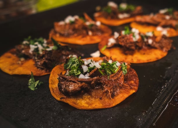 Tacos being made on grill, Street Local at Tacos Mixes Los Angeles