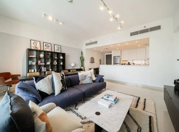 a living room with a couch and a television