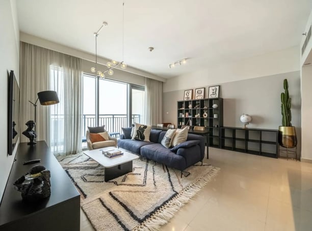 a living room with a couch and a television