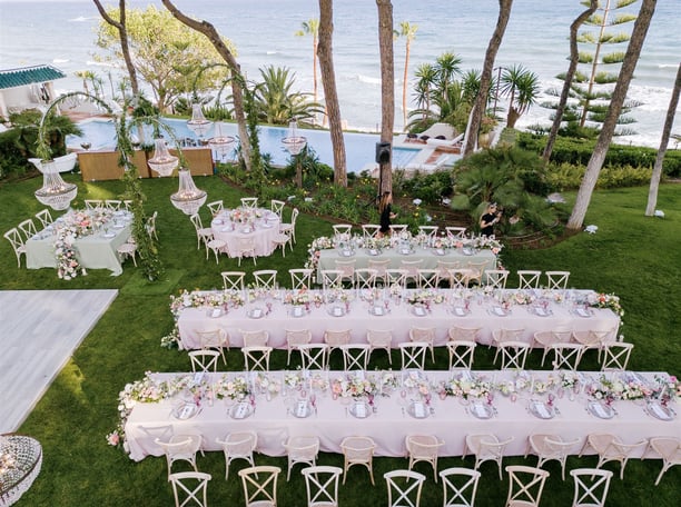 Destination wedding setup in the seaside gardens of Villa El Rincon in Marbella