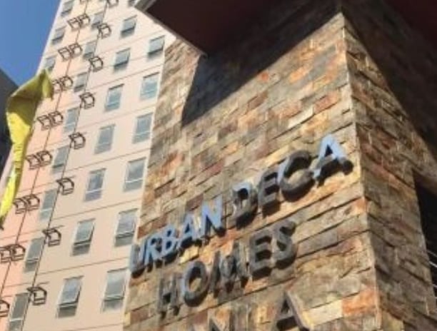 a tall building with a sign that says american eagle