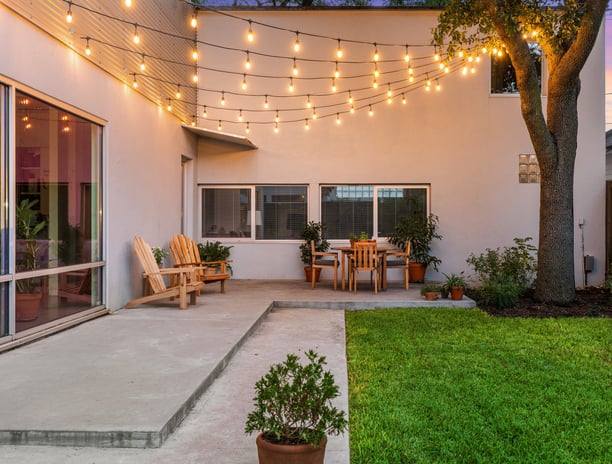 patio string lights displayed above a back patio