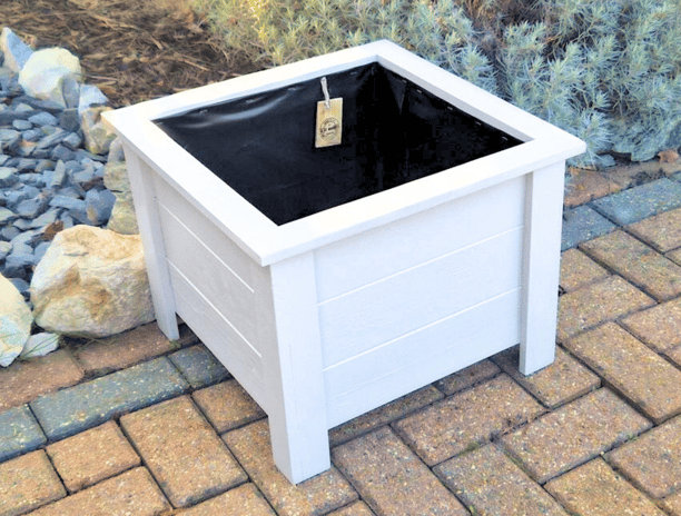 Wooden square planter on legs