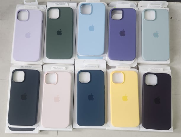 a group of six different colored iphone cases