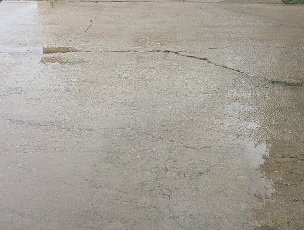 A freshly cleaned driveway included from an actual customer review. Located in Denton Texas.