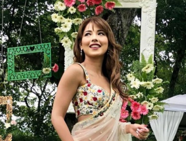 a model posing in front of our decoration