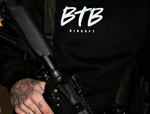 ready for action with my airsoft rifle and black BTB hoody