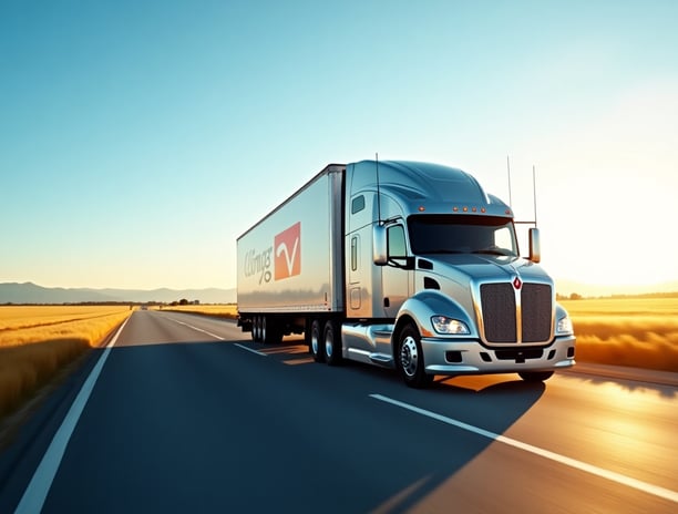 a semi truck driving down a highway
