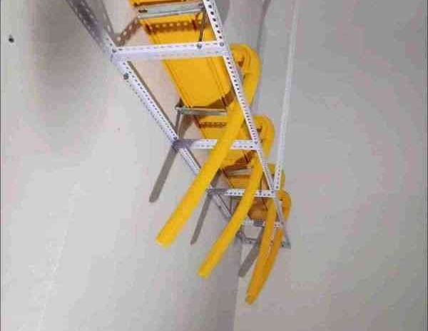 a cable ladder to reach the ceiling in a room