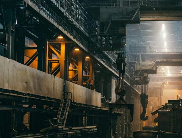 a factory with a large amount of steel and a lot of machinery
