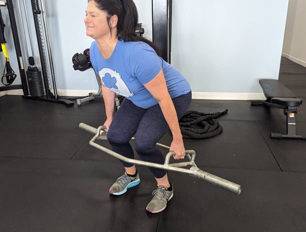 Christi lifting heavy with the hex bar