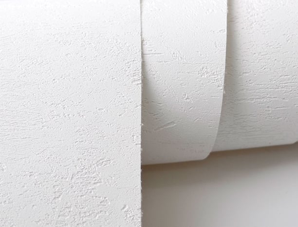 a roll of toilet paper with a white paper roll