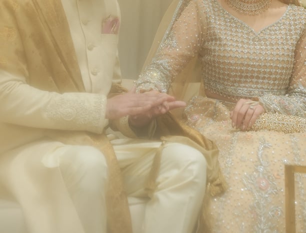 a man and woman in a wedding dress