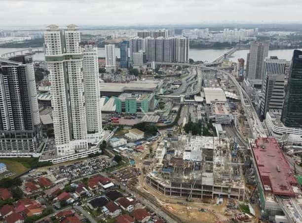 Alt: "Aerial view of Johor CIQ checkpoint and Bukit Chagar RTS station construction" Alt: "Skyline o
