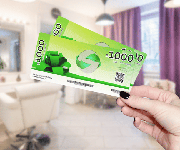 a person holding a green card with a green card