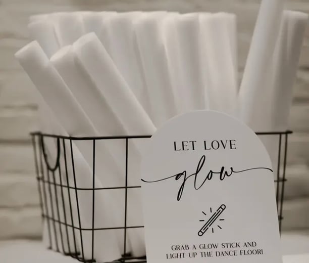 a basket of paper towels and a sign that says let's love flow