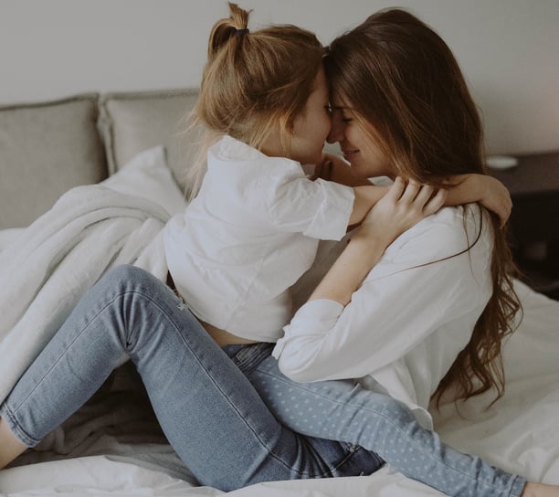 Family Therapy (mom and child embracing)