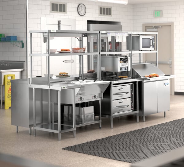 a kitchen with a large counter top and a clock on the wall