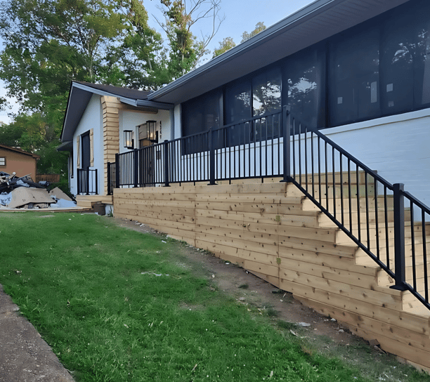 a house with a fenced in area decks, porch