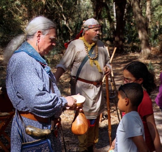 picture of Native Americans teaching children
