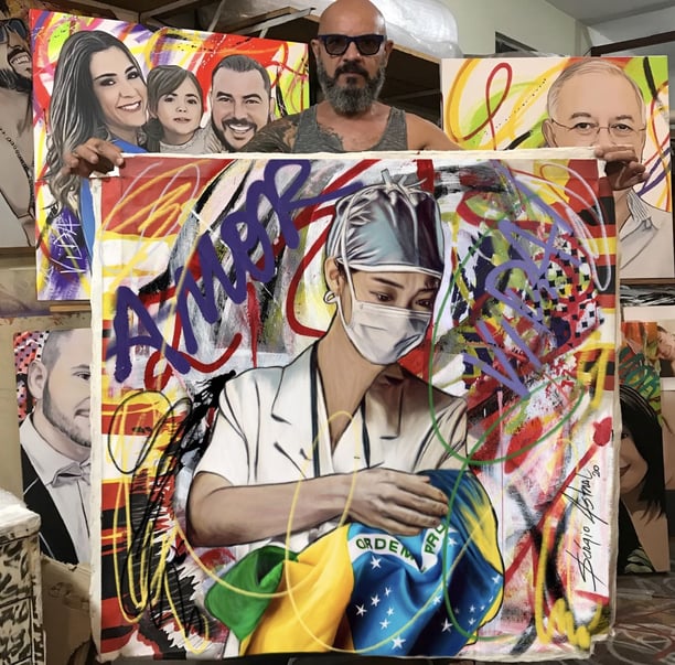 a man holding a painting of a woman with a mask on