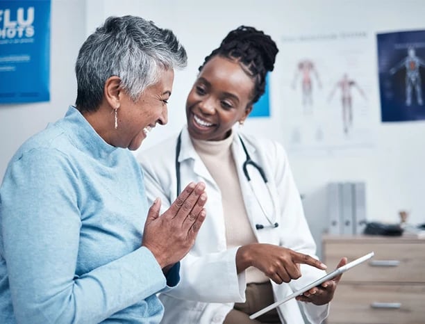 elderly woman with a doctor