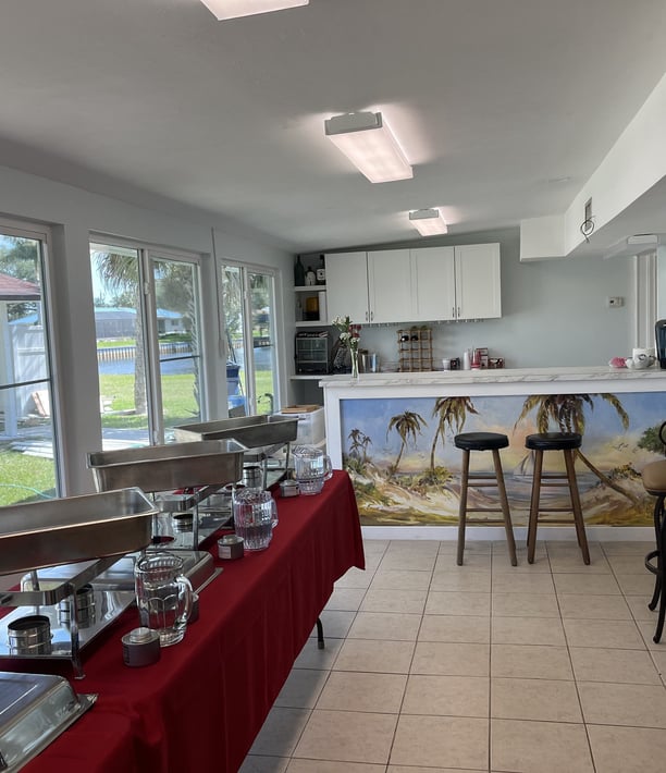 a buffet table with a buffet table set up for a buffet