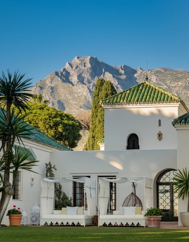 Garden view of Villa El Rincon with the iconic La Concha mountain as a stunning backdrop.