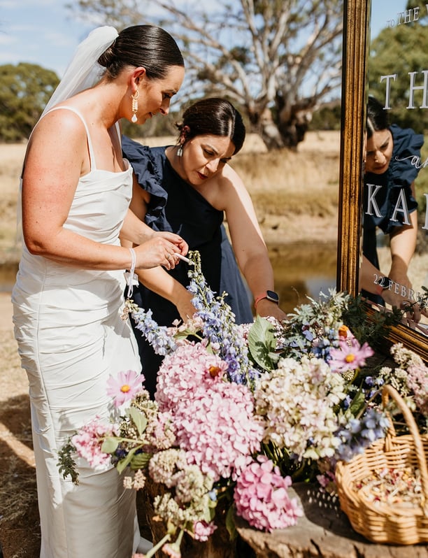 Official marriage documents being signed withNoosa and Sunshine Coast celebrant Nikki Bowden