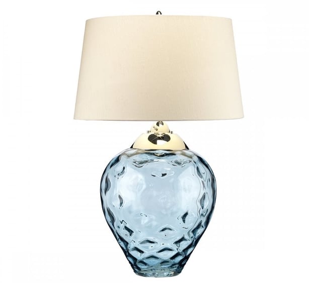 blue glass lamp base with cream lamp shade