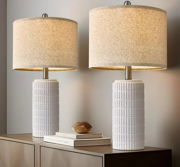 two white base and cream colored lamp shade