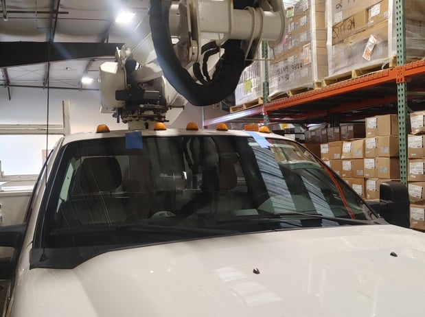 Service vehicle with a new windshield