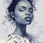 a black woman with freckles