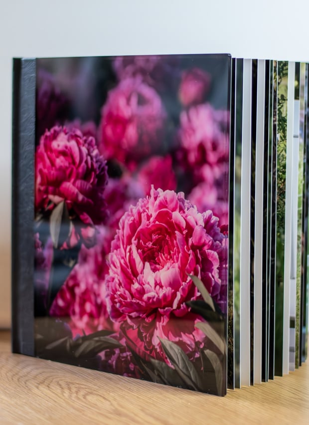 a book with a picture of a bunch of flowers