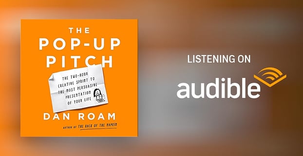 a book cover with a photo of a book and a microphone